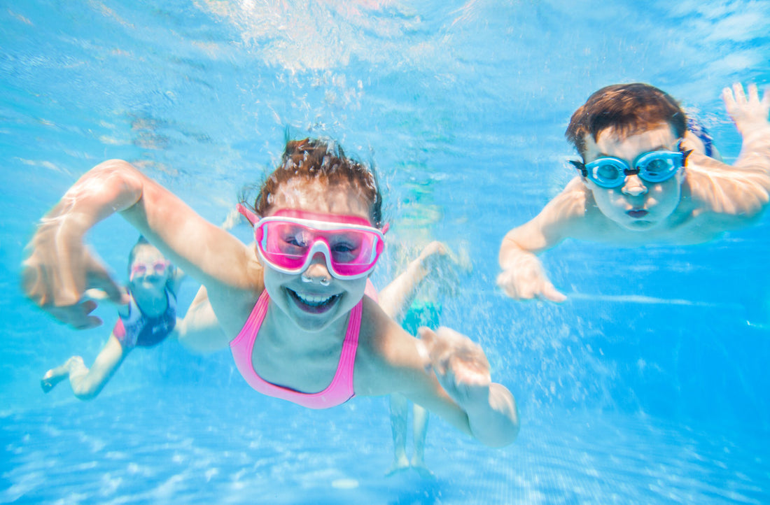 Children swimming underwater