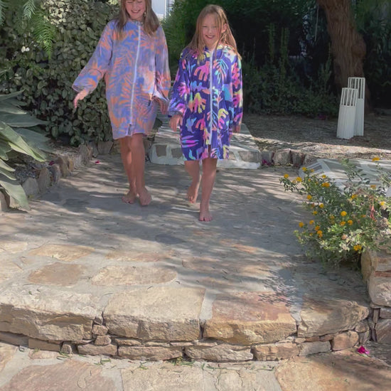 Colourful towelling robes suitable for the pool, beach and bath